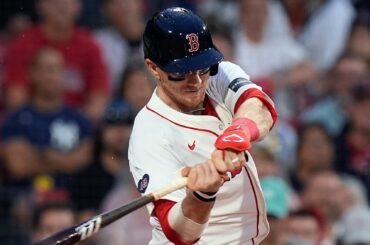 Danny Jansen jouant pour les Jays et les Red Sox dans le même match